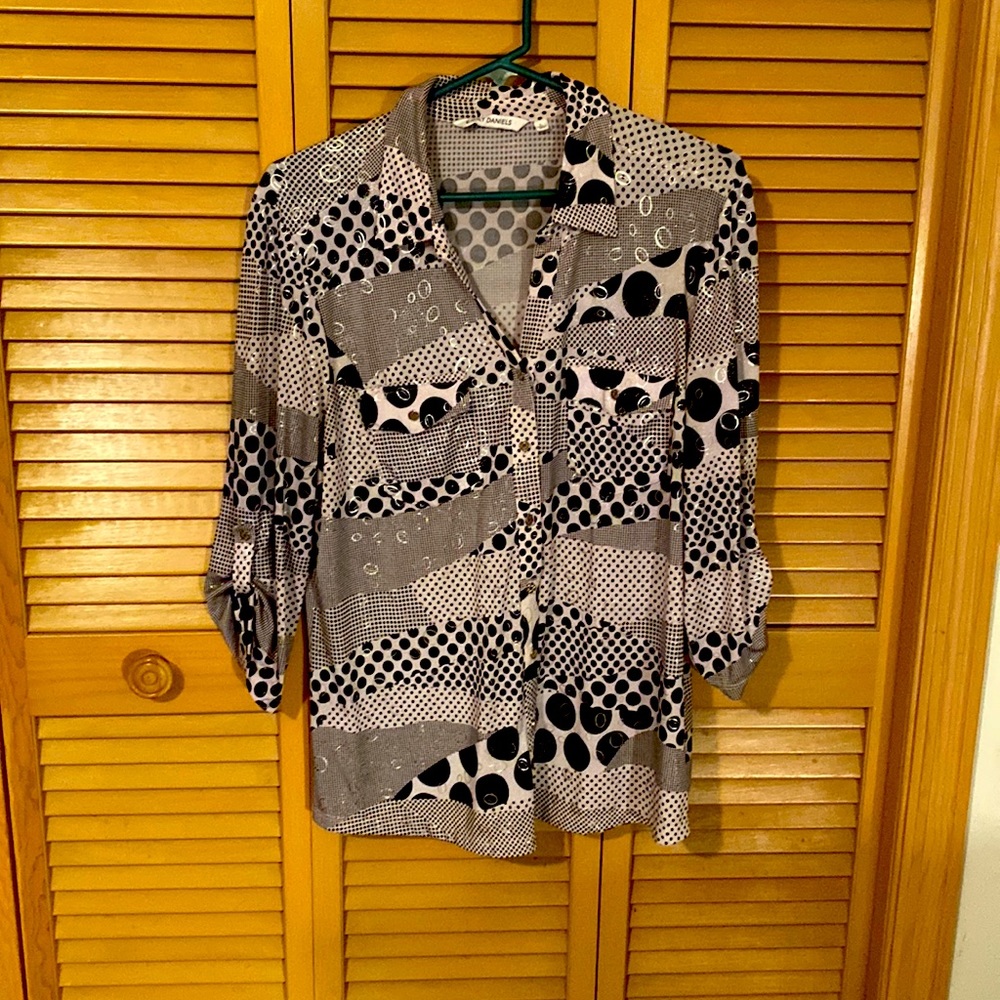 Women’s size large blouse.
